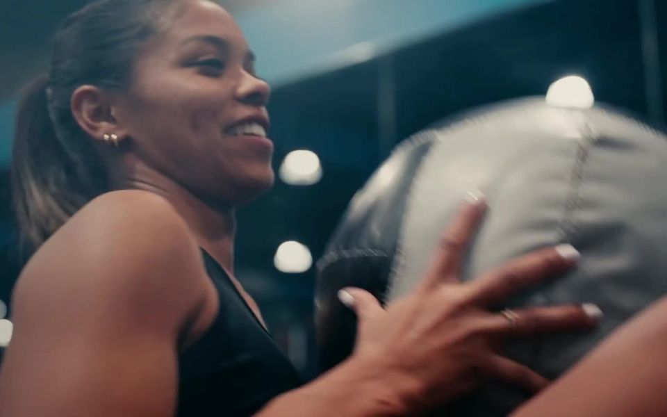 Athlete catching a medicine ball