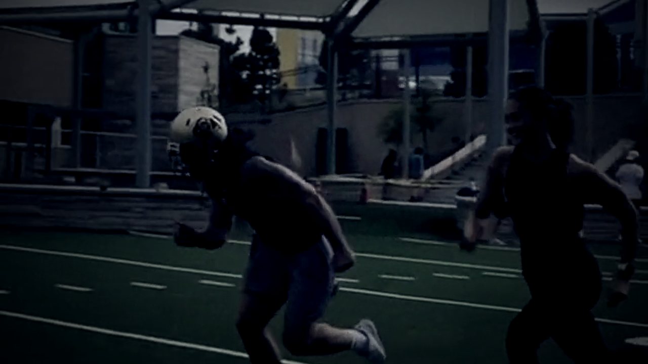 Athletes sprinting on the Elite turf